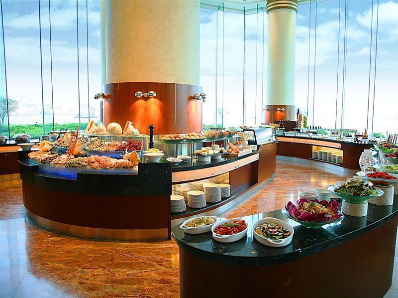 Harbour Grand Kowloon Hotel Hong Kong Ngoại thất bức ảnh A buffet at a hotel